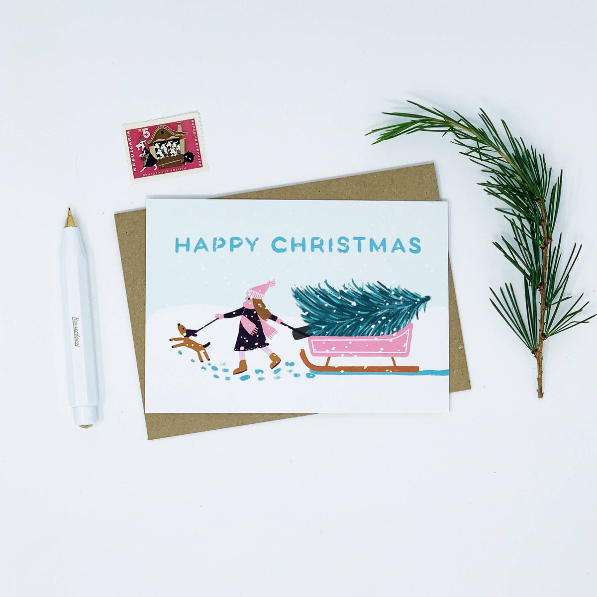 Girl with Pink Sledge - Happy Christmas